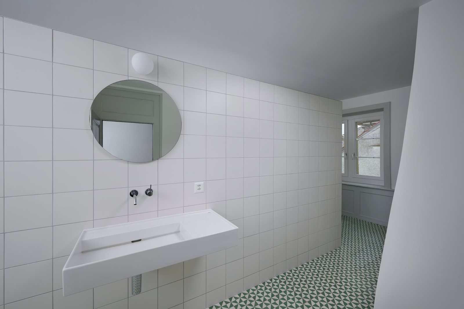 Salle de bain rénovée dans un appartement ancien à Neuchâtel
